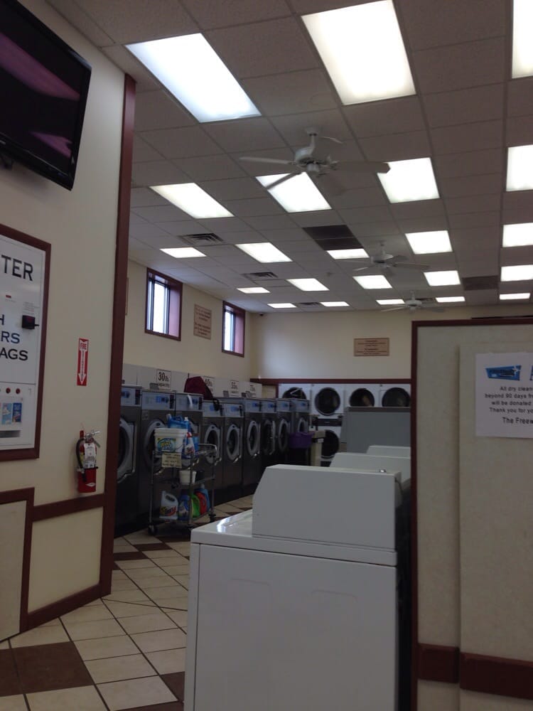 Bright spacious laundromat interior